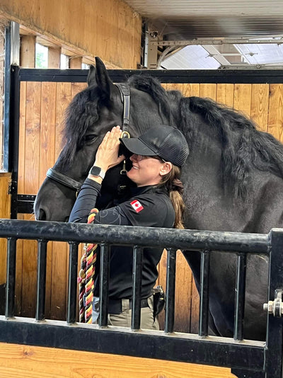 Equi-Tape Certified practitioner helping a beautiful horse!